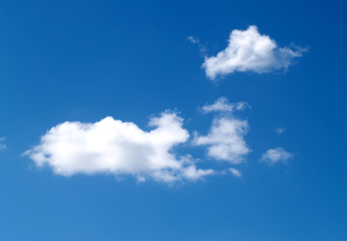 Clouds in a blue sky representing cloud based storage services